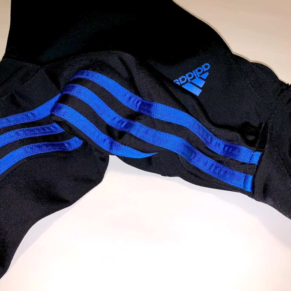 Blue striped Adidas jacket. Size: (L 14-16)